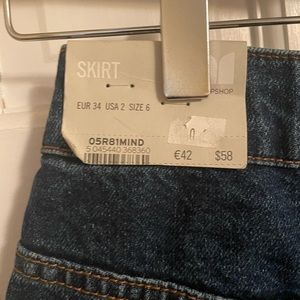This is a brand new Top denim skirt with tags